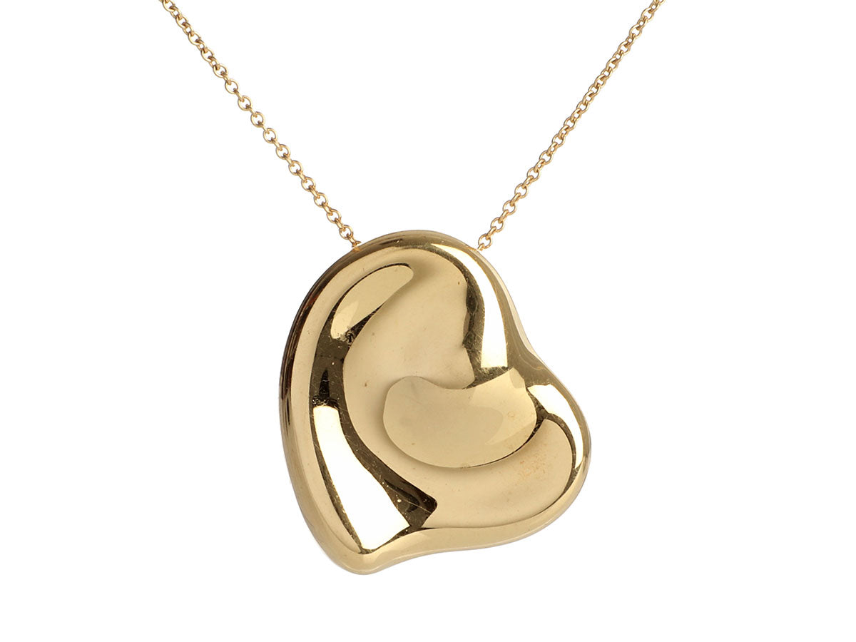 Elsa Peretti® Open Heart pendant in 18k gold. | Heart necklace tiffany,  Tiffany and co necklace, Heart pendant